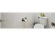 Cozy half bath featuring toilet, open floorspace and modern fixtures at 6684 Devlin Ln, Wesley Chapel, FL 33545