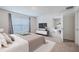 Relaxing bedroom with a large window and stylish decor at 682 Olive Conch St, Ruskin, FL 33570
