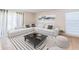 Inviting living room with a large sectional sofa and stylish decor at 682 Olive Conch St, Ruskin, FL 33570