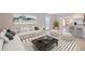 Spacious living room with an open layout connected to the kitchen at 682 Olive Conch St, Ruskin, FL 33570