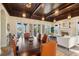 Dining area with a fireplace and access to an outdoor space at 801 Brightwaters Ne Blvd, St Petersburg, FL 33704