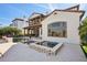 Rear exterior view of the home with a pool, spa, and outdoor seating area at 801 Brightwaters Ne Blvd, St Petersburg, FL 33704