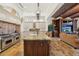 Spacious kitchen with large island, professional-grade appliances, and open layout to the living area at 801 Brightwaters Ne Blvd, St Petersburg, FL 33704