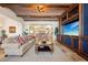Open concept living space with custom built-ins and view to the kitchen at 801 Brightwaters Ne Blvd, St Petersburg, FL 33704