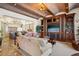 Inviting living area with media center, open to the kitchen and dining area at 801 Brightwaters Ne Blvd, St Petersburg, FL 33704