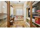 Well-organized mudroom area with built-in storage, desk, and natural light at 801 Brightwaters Ne Blvd, St Petersburg, FL 33704