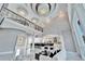 Spacious living room with soaring ceilings, marble floors, and an open concept layout at 9401 93Rd St, Seminole, FL 33777