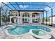 Beautiful screened in backyard pool area featuring an in-ground spa, elegant design, and ample space at 9401 93Rd St, Seminole, FL 33777