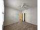 Bright bedroom with closet and ceiling fan, offering a comfortable living space at 10232 Grant Creek Dr, Tampa, FL 33647