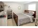 Cozy bedroom with a comfortable bed and neutral decor at 1208 Orange Ave, Dunedin, FL 34698