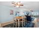 Cozy dining area adjacent to the living room, perfect for casual meals and entertaining guests with style at 1868 Shore S Dr # 209, South Pasadena, FL 33707
