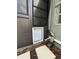 Installed pet door in a screened patio at 20 Cypress Dr, Palm Harbor, FL 34684