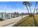 Community boat dock with multiple boat slips and well maintained landscaping at 420 64Th Ave # 1005, St Pete Beach, FL 33706