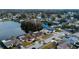 Aerial view of the community showing waterfront homes and neighborhood streets with lush landscaping at 4728 Swallowtail Dr, New Port Richey, FL 34653