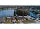 Charming single-Gathering homes along the lakefront, showcasing well-maintained lawns and neighborhood tranquility at 4728 Swallowtail Dr, New Port Richey, FL 34653