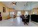 Comfortable living space featuring tile flooring and an abundance of natural light at 4728 Swallowtail Dr, New Port Richey, FL 34653