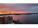 Sunset view overlooking the bay, condominium, and coastal scenery at 7700 Sun Island S Dr # 702, South Pasadena, FL 33707