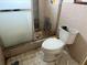 Bathroom toilet and shower with grime at 12812 1St Isle, Hudson, FL 34667