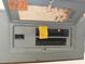 View of opened electrical panel with assorted notes at 12812 1St Isle, Hudson, FL 34667