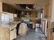 Kitchen ready to be updated, featuring ample storage, a functional layout and good sunlight at 12812 1St Isle, Hudson, FL 34667