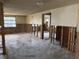 Spacious living room with great potential for updates, featuring a blank canvas for custom design at 12812 1St Isle, Hudson, FL 34667