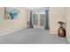 Welcoming bedroom bathed in natural light with comfortable carpeting, creating an inviting space at 310 Summer Clouds Pl, Brandon, FL 33511