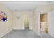 Spacious bedroom featuring plush carpeting, a walk-in closet, and lots of natural light at 310 Summer Clouds Pl, Brandon, FL 33511