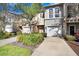 Charming townhome featuring well-maintained landscaping and a private garage for convenient parking at 310 Summer Clouds Pl, Brandon, FL 33511