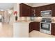 Well-equipped kitchen with stainless steel appliances and a functional design for cooking at 310 Summer Clouds Pl, Brandon, FL 33511