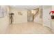 Spacious living room with tile flooring, neutral paint, and staircase at 310 Summer Clouds Pl, Brandon, FL 33511