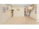 Spacious living room features neutral walls, tile flooring, and modern decor at 310 Summer Clouds Pl, Brandon, FL 33511