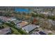 This aerial view shows the property's location with proximity to a beautiful lake, pool, and other community features at 3110 Bent Creek Dr, Valrico, FL 33596