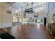 A spacious club interior features high ceilings, expansive windows, and elegant lighting fixtures at 3110 Bent Creek Dr, Valrico, FL 33596