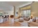 Bright living room with hardwood floors, neutral decor, and open concept design at 3110 Bent Creek Dr, Valrico, FL 33596