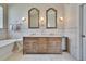 Elegant main bathroom featuring a soaking tub, double vanity, and designer accents at 3110 Bent Creek Dr, Valrico, FL 33596