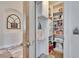 Well-organized pantry with ample shelving and storage space, perfect for keeping your kitchen tidy at 3110 Bent Creek Dr, Valrico, FL 33596
