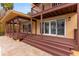 Outdoor deck area with patio, lighting, and stairway to the backyard at 316 Shore E Dr, Oldsmar, FL 34677