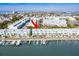 Beautiful waterfront community with private docks, swimming pools, and lush landscaping at 657 Garland Cir, Indian Rocks Beach, FL 33785