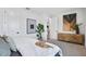 This bedroom features art pieces, plants, and a cabinet for storage at 11341 Hardwood Hammock Ln, Riverview, FL 33569