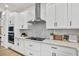 Kitchen showcases stainless steel appliances, sleek cabinets and modern finishes at 11341 Hardwood Hammock Ln, Riverview, FL 33569