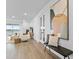 Bright and airy living room with lake views and modern décor at 11341 Hardwood Hammock Ln, Riverview, FL 33569