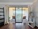 Balcony with ceiling fan, two chairs, small table, and a cat tree at 13600 Egret Blvd # 204K, Clearwater, FL 33762