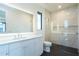 Modern bathroom featuring a walk-in shower, sleek vanity, and stylish finishes at 2081 Michigan Ne Ave, St Petersburg, FL 33703