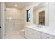 Modern bathroom features a glass-enclosed shower and sleek vanity with ample counter space at 2081 Michigan Ne Ave, St Petersburg, FL 33703
