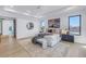 Stylish bedroom with bright wood floors, recessed lighting, and an adjacent bathroom at 2081 Michigan Ne Ave, St Petersburg, FL 33703