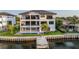 Waterfront home with multiple balconies and a private dock at 2081 Michigan Ne Ave, St Petersburg, FL 33703