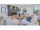 Bright living room featuring a modern fireplace, comfortable seating, and stylish decor at 2081 Michigan Ne Ave, St Petersburg, FL 33703