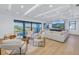 Bright living room with modern furniture, hardwood floors, and water view at 2081 Michigan Ne Ave, St Petersburg, FL 33703