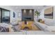 Bright living room with a modern fireplace and plenty of natural light from the ocean view at 2081 Michigan Ne Ave, St Petersburg, FL 33703