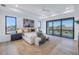 Beautifully staged main bedroom features contemporary decor and balcony access at 2081 Michigan Ne Ave, St Petersburg, FL 33703